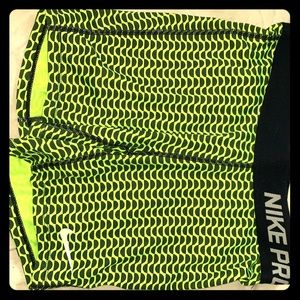 Lime green and black patterned Nike Pros